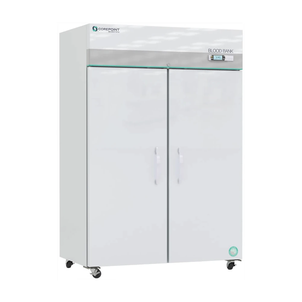 A large, white blood bank refrigerator with two doors, a digital display, and wheels at the base. The label BLOOD BANK and a Corepoint logo are visible on the top front panel.